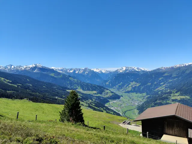 The highlands of the alps with some snowy peaks.